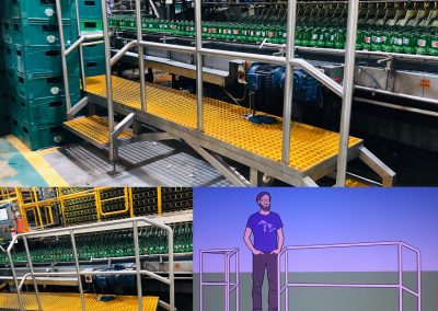 A man standing next to a warehouse with a large rack.